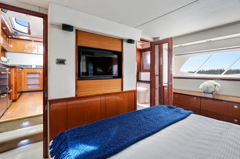 Majestic Stars Yacht Photos Pics Luxurious interior of 2012 Sea Ray Sundancer 580 yacht with modern amenities and elegant design.