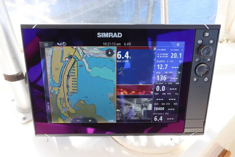 Sea Breeze Yacht Photos Pics Simrad navigation display on 1985 Hatteras 43 Motor Yacht, showing nautical charts and data.