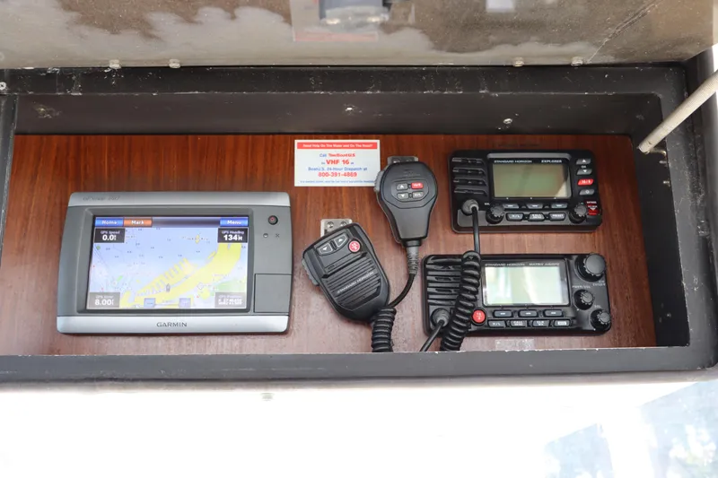 Sea Breeze Yacht Photos Pics Navigation and communication equipment on a 1985 Hatteras 43 Motor Yacht dashboard.