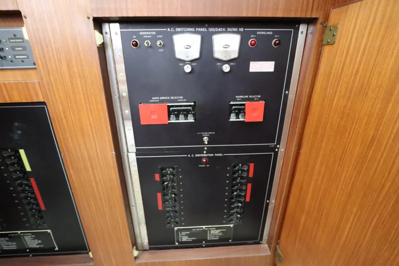 Sea Breeze Yacht Photos Pics Electrical panel on a 1985 Hatteras 43 Motor Yacht, featuring switches and controls.