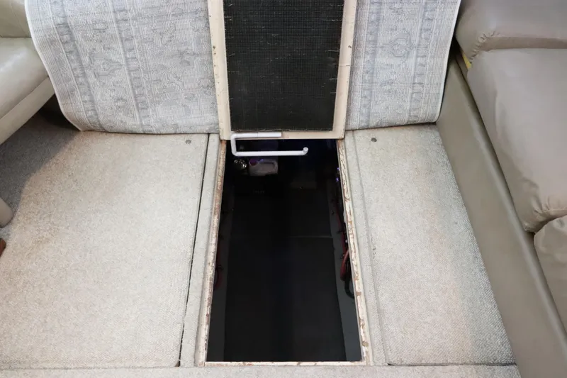 Sea Breeze Yacht Photos Pics Interior view of 1985 Hatteras 43 Motor Yacht with open floor hatch.