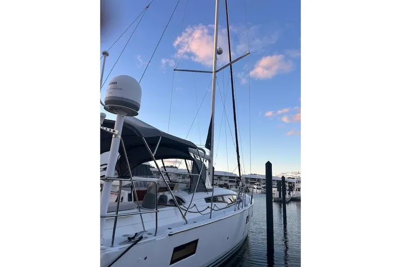 Agua Especial Yacht Photos Pics 2016 Jeanneau 54 sailboat docked at marina under blue sky.