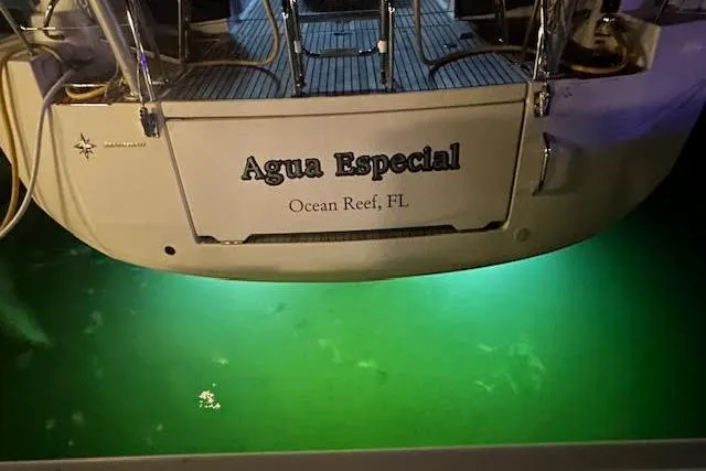 Agua Especial Yacht Photos Pics Stern of 2016 Jeanneau 54 yacht "Agua Especial" with underwater lights, Ocean Reef, FL.