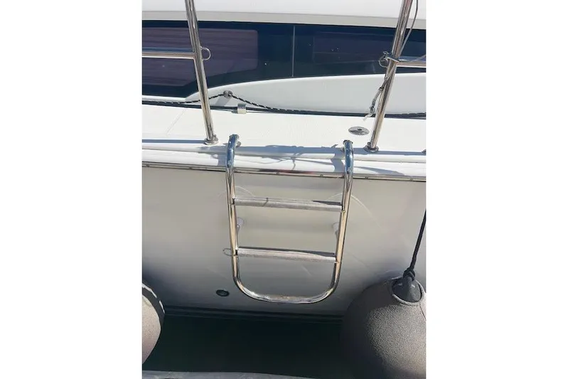 Agua Especial Yacht Photos Pics Stainless steel ladder on 2016 Jeanneau 54 yacht deck.