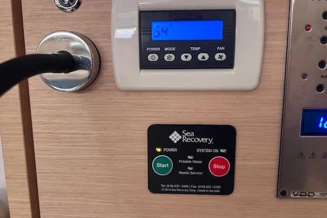 Agua Especial Yacht Photos Pics Control panel on a 2016 Jeanneau 54 yacht, featuring Sea Recovery system.