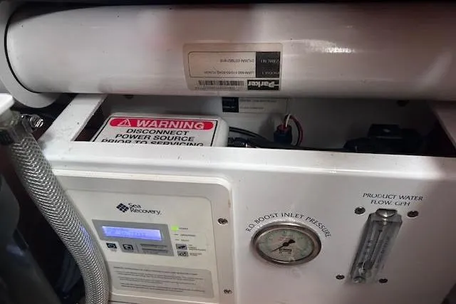 Agua Especial Yacht Photos Pics Control panel and components of a 2016 Jeanneau 54 yacht's water system.