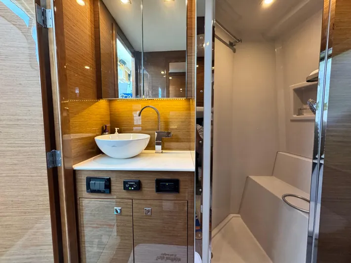 Truly Ineffable Yacht Photos Pics Luxurious bathroom in 2019 Cruisers Yachts 42 Cantius with modern fixtures and elegant design.