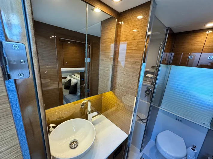 Truly Ineffable Yacht Photos Pics Luxurious bathroom in 2019 Cruisers Yachts 42 Cantius, featuring modern fixtures and elegant design.