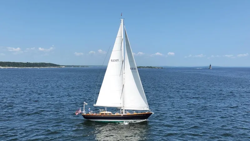 Nala Yacht Photos Pics Sailing yacht Lyman-Morse Sparkman & Stephens Sloop, 2004, cruising on open sea under clear skies.