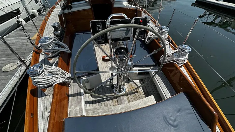 Nala Yacht Photos Pics 2004 Lyman-Morse Sparkman & Stephens Sloop cockpit with steering wheel and winches.