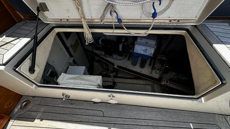 Nala Yacht Photos Pics Open hatch of 2004 Lyman-Morse Sparkman & Stephens Sloop, revealing interior equipment.