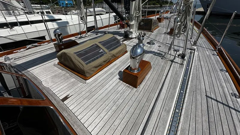 Nala Yacht Photos Pics Deck of 2004 Lyman-Morse Sparkman & Stephens Sloop with solar panels and polished fittings.
