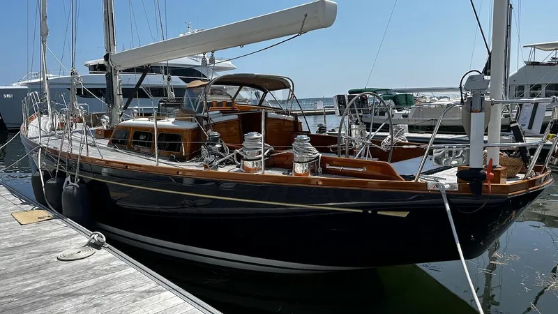 Nala Yacht Photos Pics 2004 Lyman-Morse Sparkman & Stephens Sloop docked at marina, showcasing elegant design and craftsmanship.