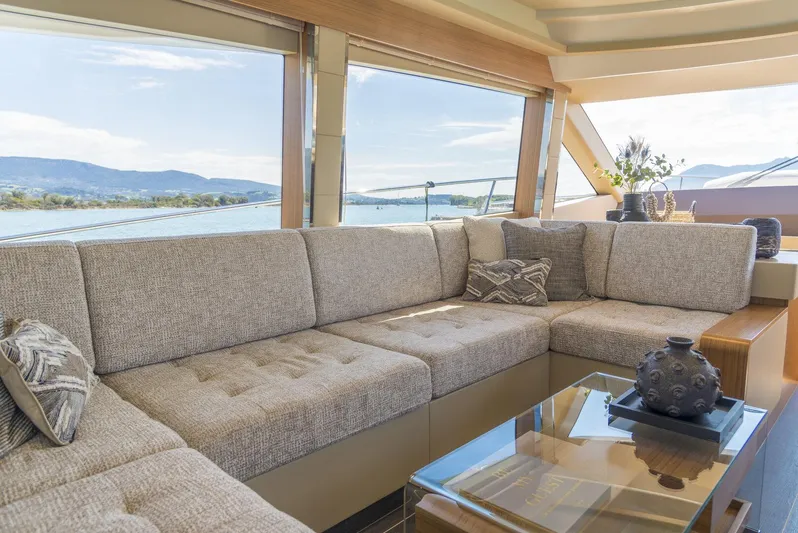  Yacht Photos Pics Luxurious interior of 2021 Greenline OceanClass 68 yacht with plush seating and scenic views.