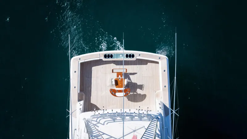 Chill 'n Yacht Photos Pics Aerial view of 2003 Bertram 67 Convertible yacht on open water.