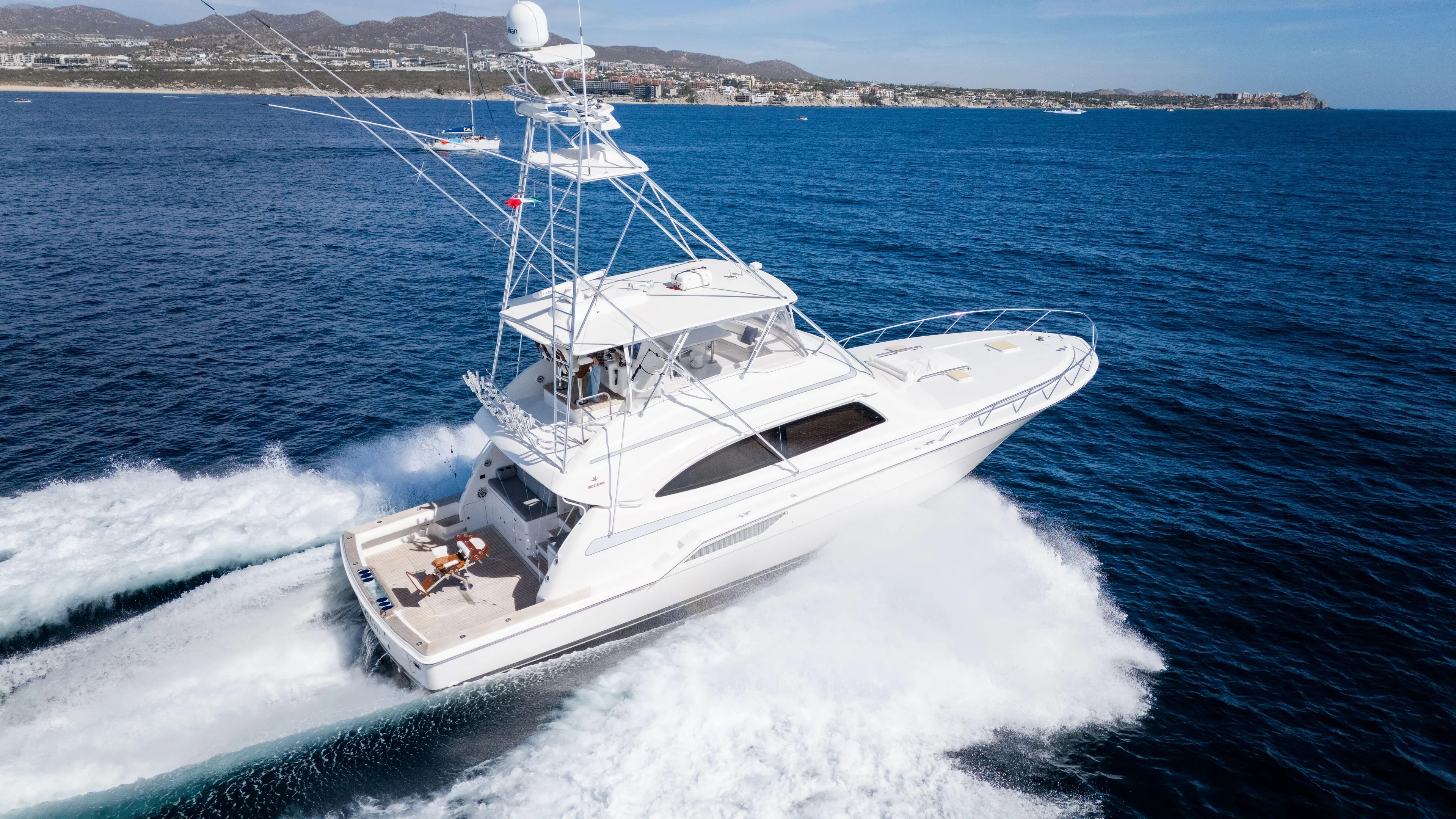 Chill 'n Yacht Photos Pics 2003 Bertram 67 Convertible yacht cruising on open sea.