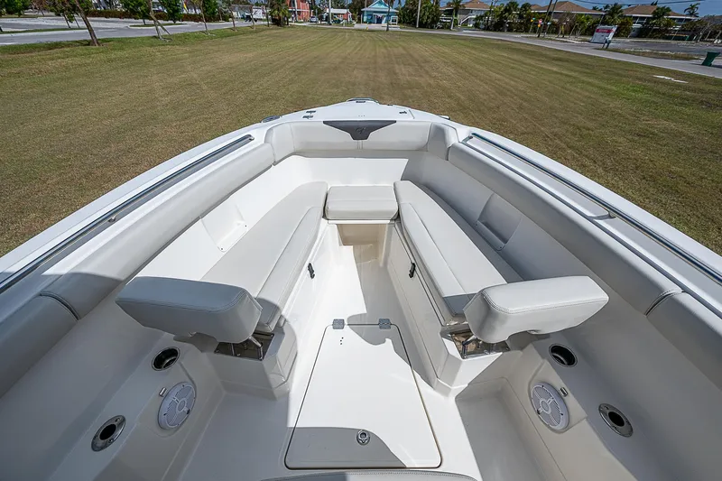  Yacht Photos Pics 2022 Sailfish 272CC boat interior with white seating and spacious layout.