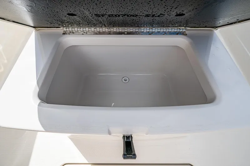  Yacht Photos Pics Sailfish 272CC 2022 boat storage compartment, open and empty.