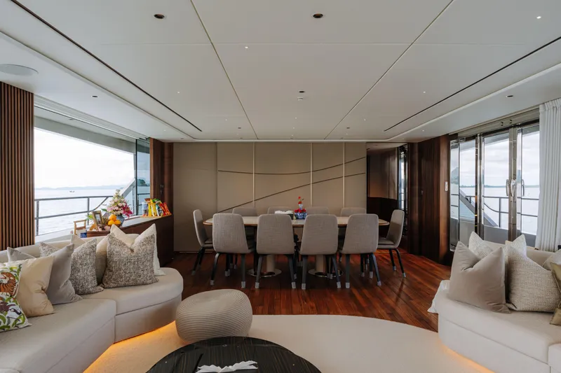  Yacht Photos Pics Luxurious interior of 2023 Princess Y95 yacht with elegant dining area and ocean view.