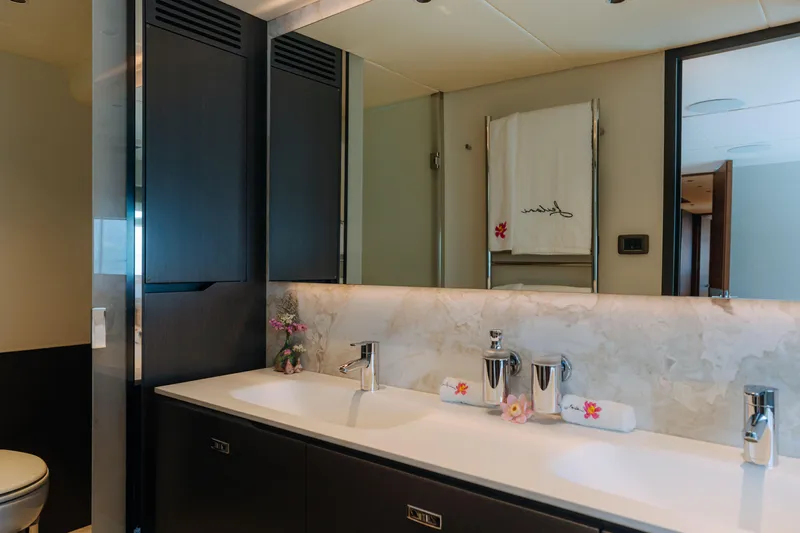  Yacht Photos Pics Luxurious bathroom interior of 2023 Princess Y95 yacht with elegant fixtures and decor.
