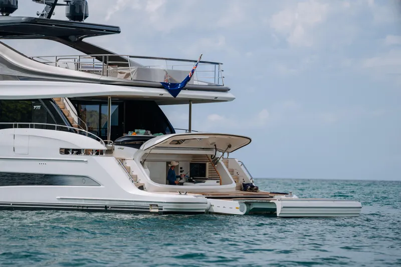  Yacht Photos Pics Luxurious 2023 Princess Y95 yacht on serene ocean waters.