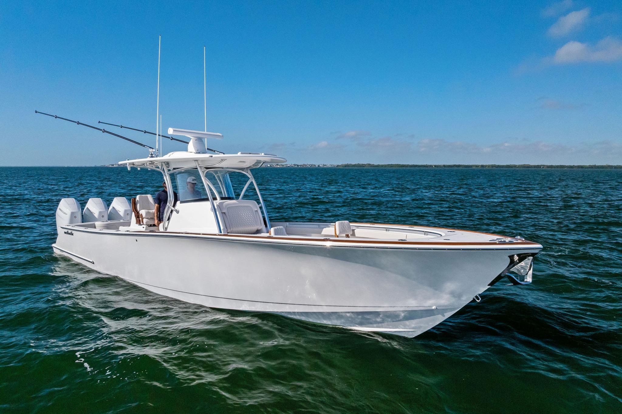 2026 Valhalla Boatworks V-37 cruising on open water under clear blue skies.