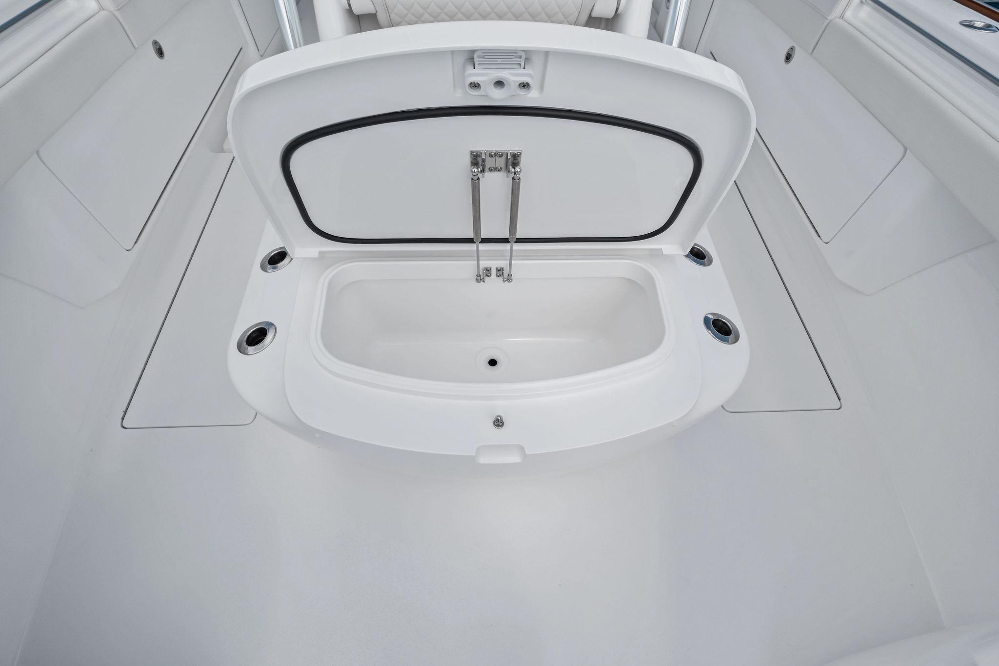 2026 Valhalla Boatworks V-37 interior storage compartment, open and spacious design.