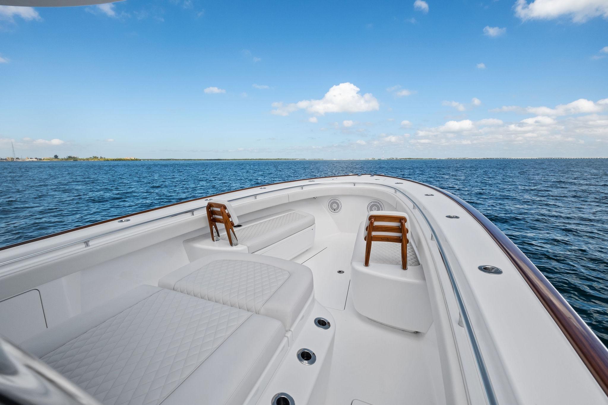 2026 Valhalla Boatworks V-37 on open water, showcasing luxurious deck and seating.