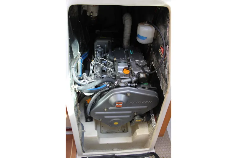 Cuckoo's Nest II Yacht Photos Pics Engine compartment of a 2002 Catalina MkII sailboat, featuring a Yanmar engine.