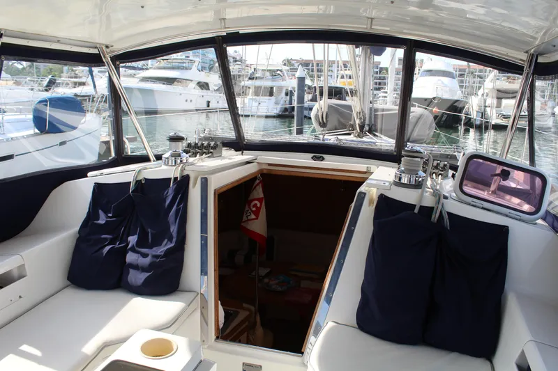 Cuckoo's Nest II Yacht Photos Pics Interior view of a 2002 Catalina MkII sailboat cockpit at a marina.