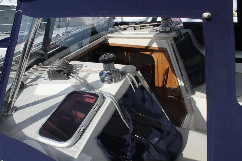 Cuckoo's Nest II Yacht Photos Pics Cockpit view of a 2002 Catalina MkII sailboat with winch and ropes.