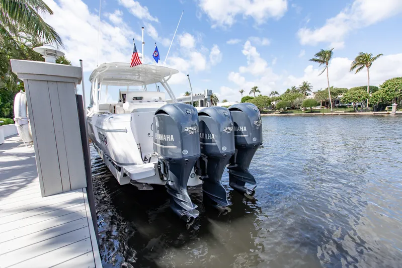  Yacht Photos Pics 2016 Intrepid 400 Cuddy boat docked with triple Yamaha 350 engines.