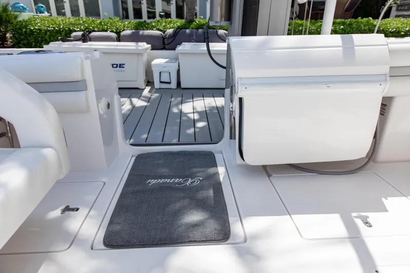  Yacht Photos Pics 2016 Intrepid 400 Cuddy boat interior with seating and storage compartments.