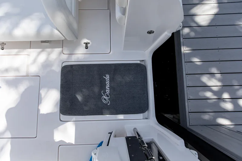  Yacht Photos Pics 2016 Intrepid 400 Cuddy boat deck with "Xanadu" mat and dockside view.