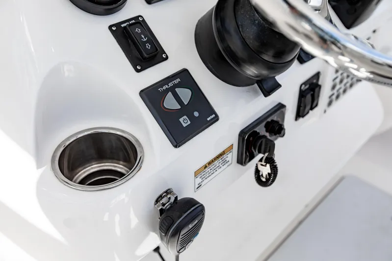  Yacht Photos Pics Control panel of a 2016 Intrepid 400 Cuddy boat with thruster controls.