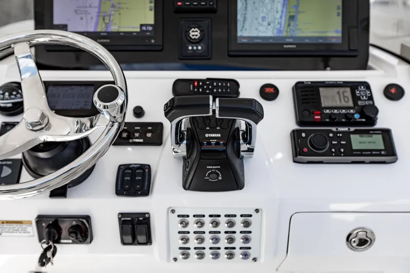  Yacht Photos Pics Control panel of a 2016 Intrepid 400 Cuddy boat with navigation and communication systems.