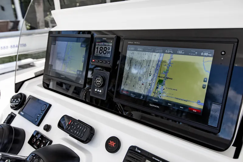  Yacht Photos Pics Dashboard of a 2016 Intrepid 400 Cuddy with advanced navigation systems.
