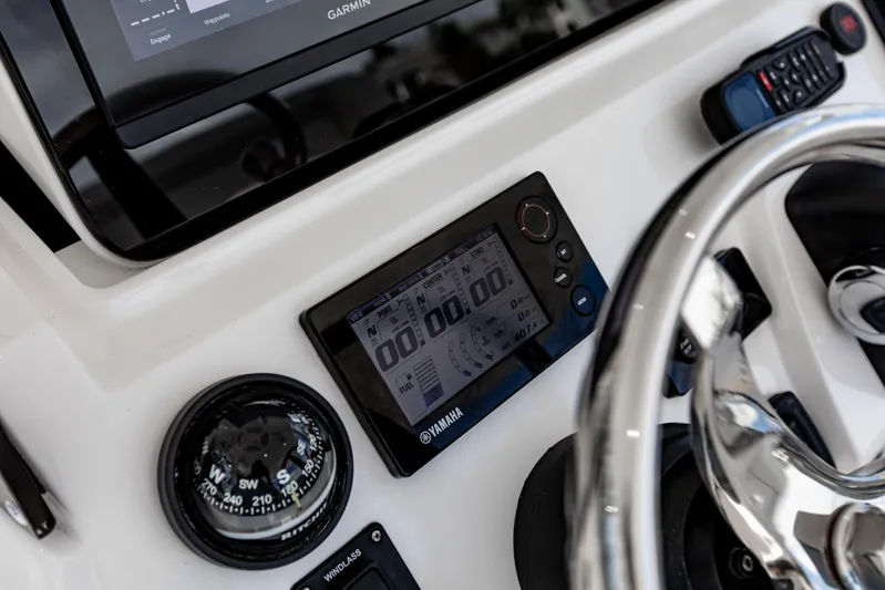  Yacht Photos Pics Control panel of 2016 Intrepid 400 Cuddy with Garmin and Yamaha displays.