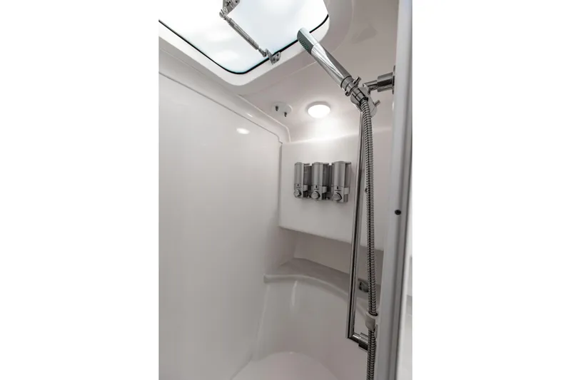  Yacht Photos Pics Interior shower of 2016 Intrepid 400 Cuddy boat with modern fixtures.