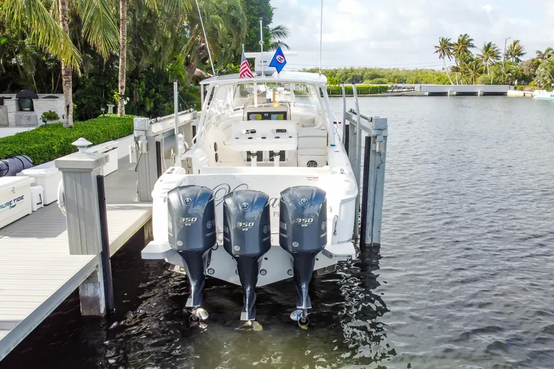  Yacht Photos Pics 2016 Intrepid 400 Cuddy boat docked with triple Yamaha 350 engines.