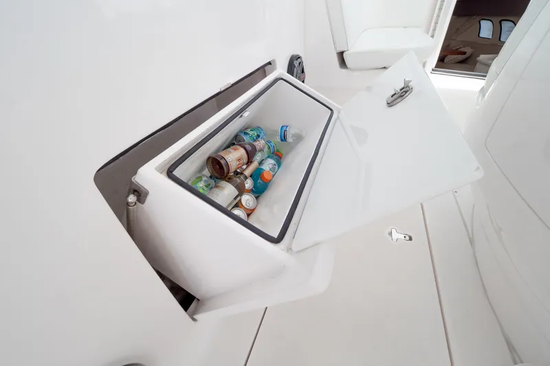  Yacht Photos Pics Built-in cooler with drinks on a 2016 Intrepid 400 Cuddy boat.