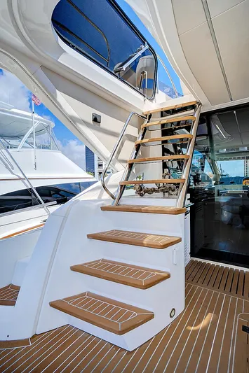 Once Around Yacht Photos Pics 2017 Sunseeker 68 Sport Yacht, teak stairs to upper deck, luxury interior.