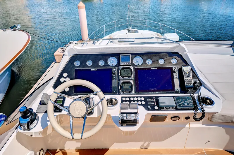 Once Around Yacht Photos Pics Cockpit of 2017 Sunseeker 68 Sport Yacht with advanced navigation systems.