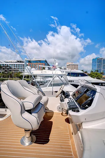 Once Around Yacht Photos Pics 2017 Sunseeker 68 Sport Yacht helm station with modern controls and luxurious seating.
