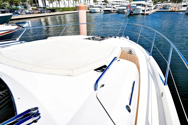Once Around Yacht Photos Pics 2017 Sunseeker 68 Sport Yacht bow view at marina.
