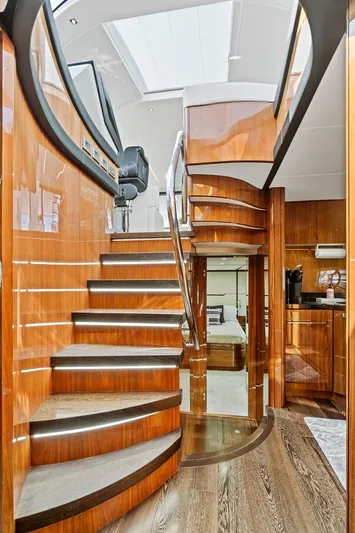 Once Around Yacht Photos Pics Interior of 2017 Sunseeker 68 Sport Yacht with elegant wooden staircase.
