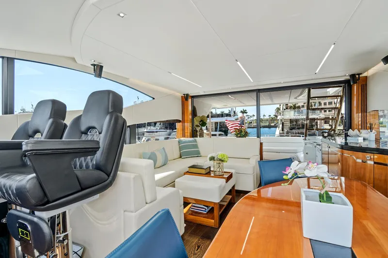 Once Around Yacht Photos Pics Luxurious interior of 2017 Sunseeker 68 Sport Yacht with modern seating and elegant decor.