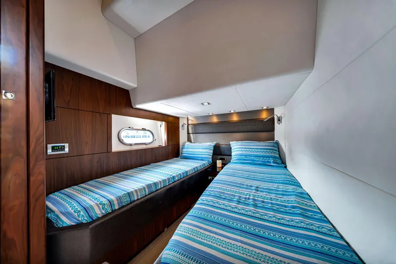 Jimbo Yacht Photos Pics Interior of 2012 Sunseeker 74 Sport Yacht with twin beds and modern design.