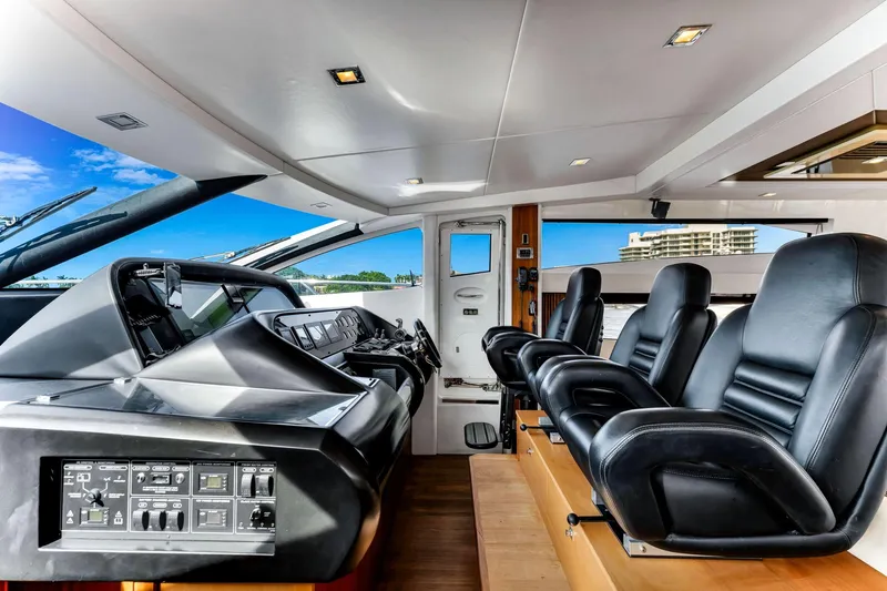 Jimbo Yacht Photos Pics Interior of 2012 Sunseeker 74 Sport Yacht with luxurious black leather seating.