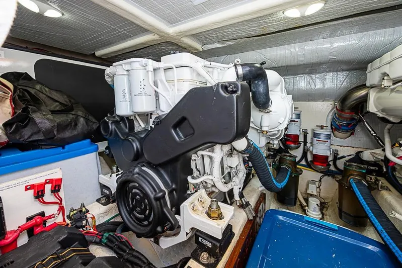  Yacht Photos Pics Engine room of 2016 Sabre 42 Salon Express, showcasing mechanical components and wiring.